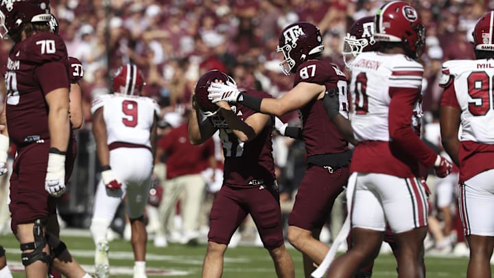 Nov 15, 2025; College Station, Texas, USA; Texas A&M Aggies kicker Randy Bond (47) reacts after missing a field goal attempt during the second quarter against the South Carolina Gamecocks at Kyle Field. Mandatory Credit: Troy Taormina-Imagn Images