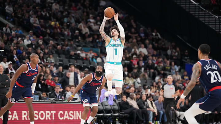 Jan 12, 2026; Inglewood, California, USA; Charlotte Hornets guard LaMelo Ball (1) shoots the against LA Clippers guard Kris Dunn (8), guard James Harden (1) and forward John Collins (20) in the first half at Intuit Dome. Mandatory Credit: Kirby Lee-Imagn Images Jan 12, 2026; Inglewood, California, USA; Charlotte Hornets guard LaMelo Ball (1) shoots the against LA Clippers guard Kris Dunn (8), guard James Harden (1) and forward John Collins (20) in the first half at Intuit Dome. Mandatory Credit: Kirby Lee-Imagn Images