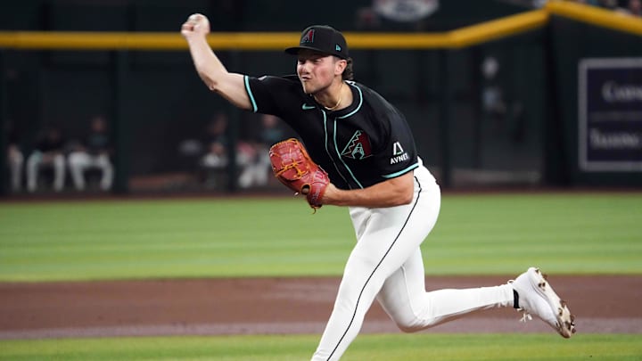 Jul 27, 2024; Phoenix, Arizona, USA; Arizona Diamondbacks pitcher Brandon Pfaadt (32) pitches against the Pittsburgh Pirates during the first inning at Chase Field. Mandatory Credit: Joe Camporeale-USA TODAY Sports