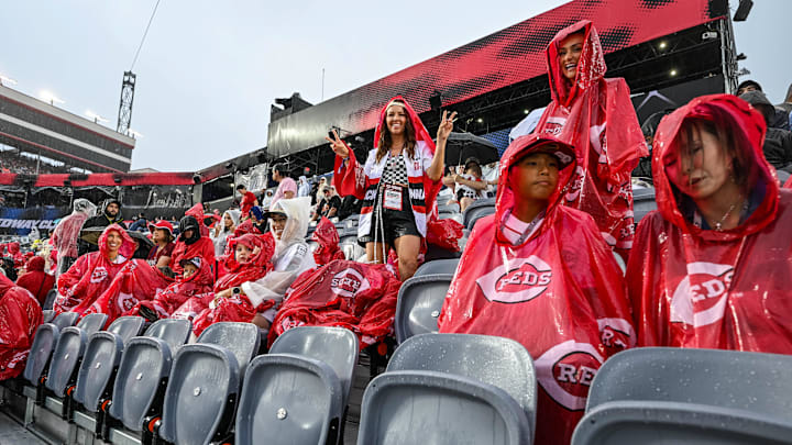Aug 2, 2025; Bristol, Tennessee, USA; Fans look on as rain delays the start of the Speedway Classic game between the Cincinnati Reds and the Atlanta Braves at Bristol Motor Speedway. Mandatory Credit: Bryan Lynn-Imagn Images
