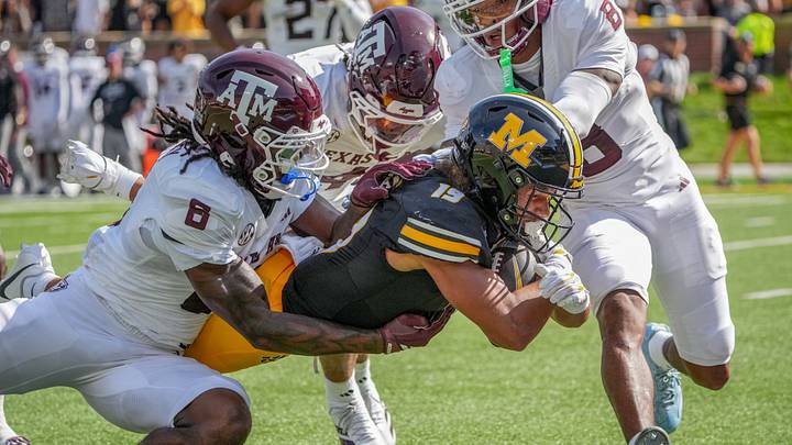 Oct 10, 2026; Columbia, Missouri, USA; Missouri Tigers wide receiver Cayden Lee (19) runs in for a touchdown as Texas A&M Aggies cornerback Jordan Shaw (8) makes the tackle during the first half of the game at Faurot Field at Memorial Stadium. Mandatory Credit: Denny Medley-Imagn Images Oct 10, 2026; Columbia, Missouri, USA; Missouri Tigers wide receiver Cayden Lee (19) runs in for a touchdown as Texas A&M Aggies cornerback Jordan Shaw (8) makes the tackle during the first half of the game at Faurot Field at Memorial Stadium. Mandatory Credit: Denny Medley-Imagn Images