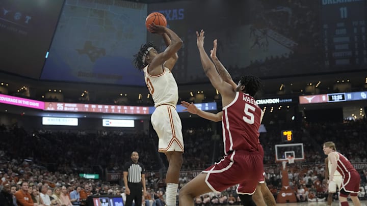 Mar 8, 2025; Austin, Texas, USA; Texas Longhorns guard Tre Johnson (20) shoots over Oklahoma Sooners forward Mohamed Wague (5) during the first half at Moody Center. Mandatory Credit: Scott Wachter-Imagn Images