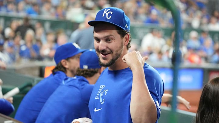 Sep 4, 2024; Kansas City, Missouri, USA; An injured Kansas City Royals first baseman Vinnie Pasquantino (9) talks with team mates against the Cleveland Guardians in the eighth inning at Kauffman Stadium. Mandatory Credit: Denny Medley-Imagn Images