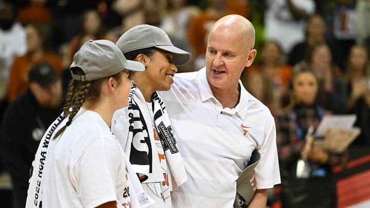 Dec 17, 2022; Omaha, Nebraska, US; Texas Longhorns head coach Jerritt Elliott celebrates after defeating the Louisville Cardinals at CHI Health Center. Mandatory Credit: Steven Branscombe-USA TODAY Sports Dec 17, 2022; Omaha, Nebraska, US; Texas Longhorns head coach Jerritt Elliott celebrates after defeating the Louisville Cardinals at CHI Health Center. Mandatory Credit: Steven Branscombe-USA TODAY Sports