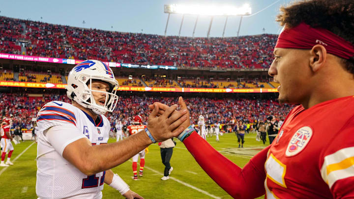 Buffalo Bills quarterback Josh Allen (17) shakes hands with Patrick Mahomes.
