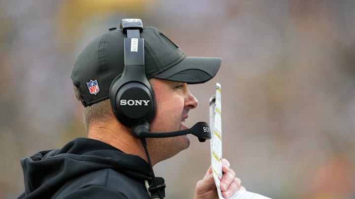 Oct 12, 2025; Green Bay, Wisconsin, USA; Cincinnati Bengals head coach Zac Taylor communicates from the sidelines during the second quarter against the Green Bay Packers at Lambeau Field. Mandatory Credit: Jeff Hanisch-Imagn Images