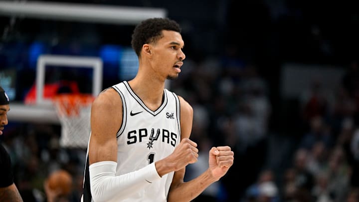 Feb 14, 2024; Dallas, Texas, USA; San Antonio Spurs center Victor Wembanyama (1) celebrates after making a shot against the Dallas Mavericks during the fist quarter at the American Airlines Center. 