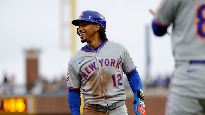 Jul 25, 2025; San Francisco, California, USA; New York Mets shortstop Francisco Lindor (12) smiles after advancing to third base on a ground out by right fielder Juan Soto (not pictured) during the first inning against the San Francisco Giants at Oracle Park. Mandatory Credit: Sergio Estrada-Imagn Images