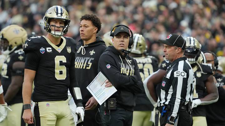 New Orleans Saints quarterback Tyler Shough and head coach Kellen Moore