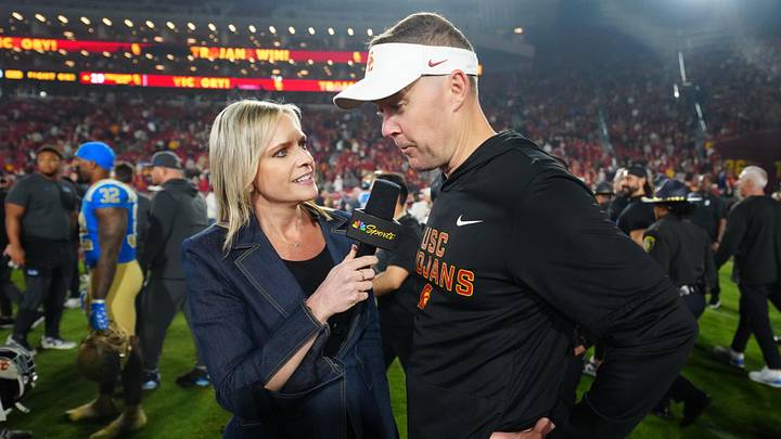 Nov 29, 2025; Los Angeles, California, USA; Southern California Trojans head coach Lincoln Riley (right) is interviewed by NBC Sports reporter Kathryn Tappen after the game against the UCLA Bruins at United Airlines Field at Los Angeles Memorial Coliseum. Mandatory Credit: Kirby Lee-Imagn Images Nov 29, 2025; Los Angeles, California, USA; Southern California Trojans head coach Lincoln Riley (right) is interviewed by NBC Sports reporter Kathryn Tappen after the game against the UCLA Bruins at United Airlines Field at Los Angeles Memorial Coliseum. Mandatory Credit: Kirby Lee-Imagn Images