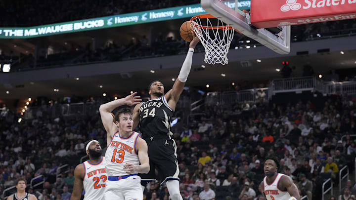Mar 28, 2025; Milwaukee, Wisconsin, USA; Milwaukee Bucks forward Giannis Antetokounmpo (34) drives to the basket against New York Knicks guard Tyler Kolek (13) in the first half at Fiserv Forum. Mandatory Credit: Michael McLoone-Imagn Images Mar 28, 2025; Milwaukee, Wisconsin, USA; Milwaukee Bucks forward Giannis Antetokounmpo (34) drives to the basket against New York Knicks guard Tyler Kolek (13) in the first half at Fiserv Forum. Mandatory Credit: Michael McLoone-Imagn Images