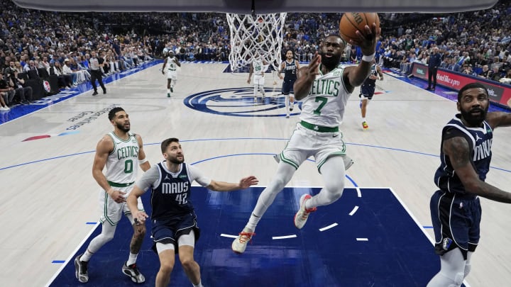Jun 12, 2024; Dallas, Texas, USA; Boston Celtics guard Jaylen Brown (7) goes up for a basket against Dallas Mavericks forward Maxi Kleber (42) and guard Kyrie Irving (right) during the first half during game three of the 2024 NBA Finals at American Airlines Center. Mandatory Credit: Julio Cortez/Pool Photo-USA TODAY Sports Jun 12, 2024; Dallas, Texas, USA; Boston Celtics guard Jaylen Brown (7) goes up for a basket against Dallas Mavericks forward Maxi Kleber (42) and guard Kyrie Irving (right) during the first half during game three of the 2024 NBA Finals at American Airlines Center. Mandatory Credit: Julio Cortez/Pool Photo-USA TODAY Sports