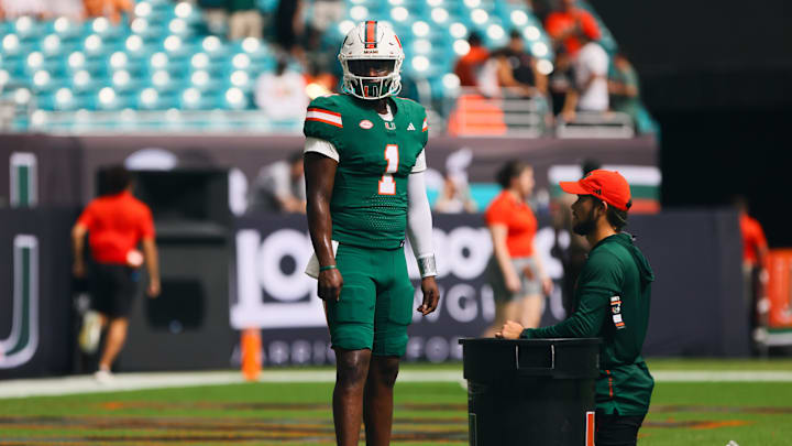 Nov 2, 2024; Miami Gardens, Florida, USA; Miami Hurricanes quarterback Cam Ward (1) looks on before the game against the Duke Blue Devils at Hard Rock Stadium. Mandatory Credit: Sam Navarro-Imagn Images