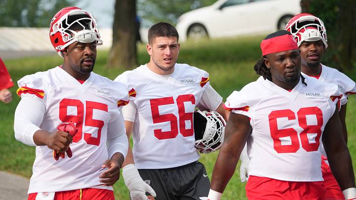Jul 29, 2026; St. Joseph, MO, USA; Kansas City Chiefs   defensive tackle Chris Jones (95) and defensive tackle Amari McNeil (93) and defensive end George Karlaftis (56) and defensive tackle Marcus Harris (68) walk down the hill to the practice fields during training camp at Missouri Western State University. Mandatory Credit: Denny Medley-Imagn Images