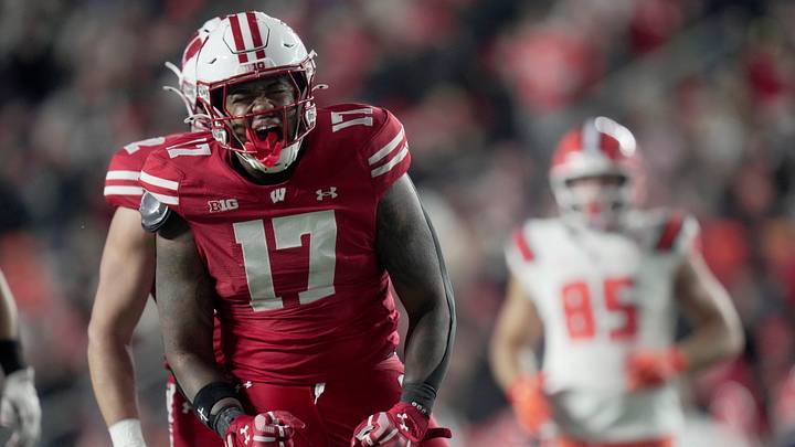 Wisconsin linebacker Darryl Peterson (17) celebrates his sack of Illinois quarterback Luke Altmyer (9) during the third quarter of their game Saturday, November 22, 2025 at Camp Randall Stadium in Madison, Wisconsin.