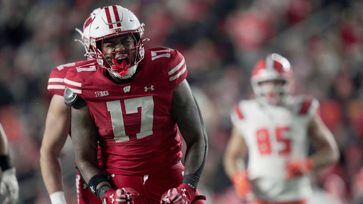 Wisconsin linebacker Darryl Peterson (17) celebrates his sack of Illinois quarterback Luke Altmyer (9) during the third quarter of their game Saturday, November 22, 2025 at Camp Randall Stadium in Madison, Wisconsin.