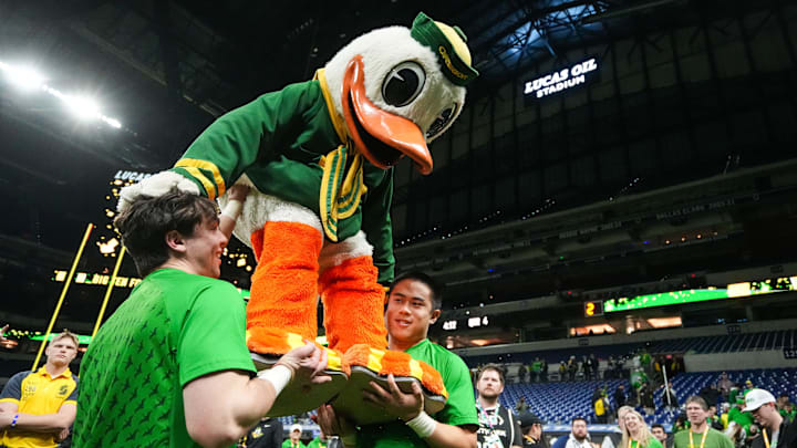 The Oregon Duck celebrates after the Big Ten championship game. The Ducks await Ohio State in the Rose Bowl quarterfinal.