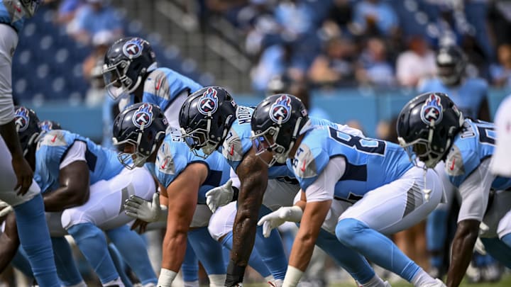 Tennessee Titans offensive line with quarterback Cam Ward