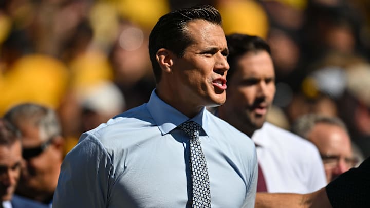Oct 1, 2022; Iowa City, Iowa, USA; Fox Sports football analyst  Brady Quinn on the sidelines during the game between the Iowa Hawkeyes and the Michigan Wolverines at Kinnick Stadium.