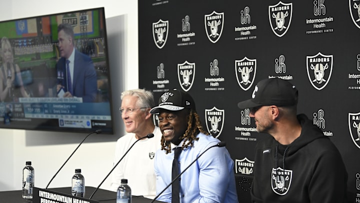 Apr 25, 2025; Henderson, NV, USA; (L-R) Las Vegas Raiders head coach Pete Carroll, Ashton Jeanty and general manager John Spytek during a news conference introducing Jeanty as the first round draft pick in the 2025 NFL Draft at Intermountain Health Performance Center. Mandatory Credit: Candice Ward-Imagn Images Apr 25, 2025; Henderson, NV, USA; (L-R) Las Vegas Raiders head coach Pete Carroll, Ashton Jeanty and general manager John Spytek during a news conference introducing Jeanty as the first round draft pick in the 2025 NFL Draft at Intermountain Health Performance Center. Mandatory Credit: Candice Ward-Imagn Images