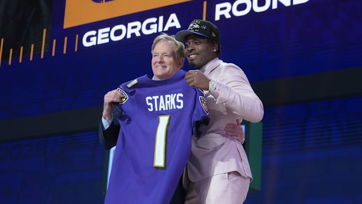 Apr 24, 2025; Green Bay, WI, USA; NFL commissioner Roger Goodell with Georgia Bulldogs safety Malaki Starks after he is selected by the Baltimore Ravens as the number 27 pick in the first round of the 2025 NFL Draft at Lambeau Field. Mandatory Credit: Kirby Lee-Imagn Images