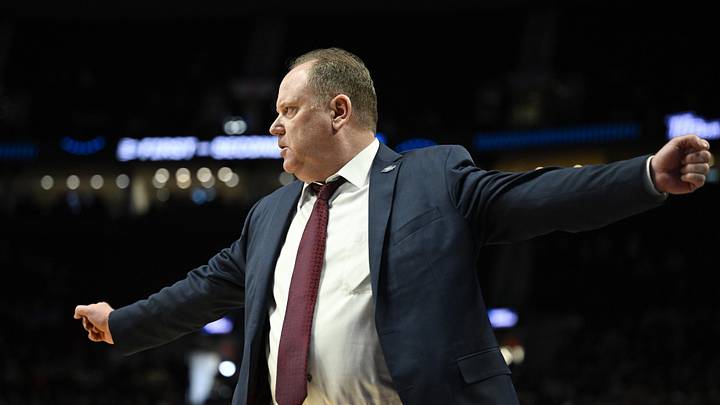 Mar 19, 2026; Portland, OR, USA; Wisconsin Badgers head coach Greg Gard reacts during the second half of a first round game of the men's 2026 NCAA Tournament against the High Point Panthers at Moda Center. Mandatory Credit: Troy Wayrynen-Imagn Images