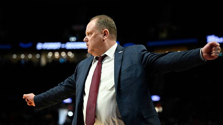Mar 19, 2026; Portland, OR, USA; Wisconsin Badgers head coach Greg Gard reacts during the second half of a first round game of the men's 2026 NCAA Tournament against the High Point Panthers at Moda Center. Mandatory Credit: Troy Wayrynen-Imagn Images