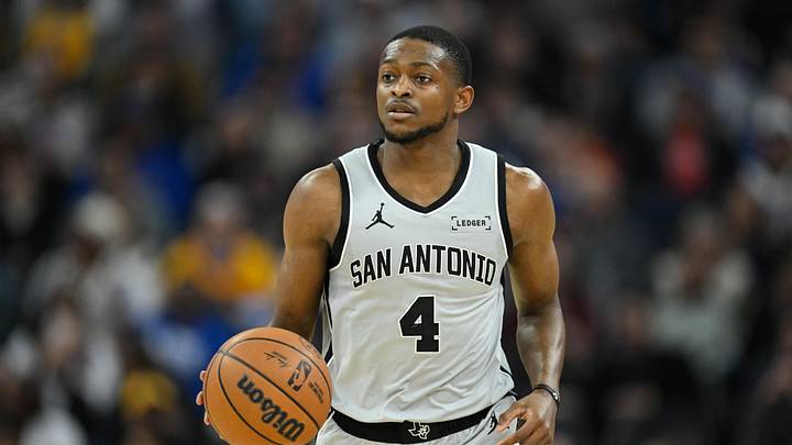 Feb 11, 2026; San Francisco, California, USA; San Antonio Spurs guard De'Aaron Fox (4) dribbles against the Golden State Warriors in the first quarter at Chase Center.