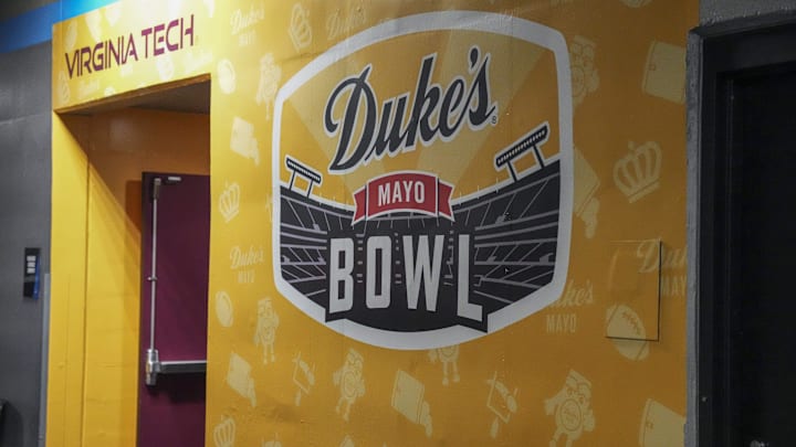 Jan 3, 2025; Charlotte, NC, USA; Signage for the Dukes Mayo Bowl between the Minnesota Golden Gophers and the Virginia Tech Hokies at Bank of America Stadium. Mandatory Credit: Jim Dedmon-Imagn Images