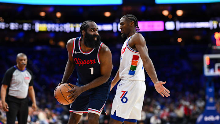 Nov 24, 2024; Philadelphia, Pennsylvania, USA; Los Angeles Clippers guard James Harden (1) controls the ball against Philadelphia 76ers guard Tyrese Maxey (0) in the third quarter at Wells Fargo Center. Mandatory Credit: Kyle Ross-Imagn Images
