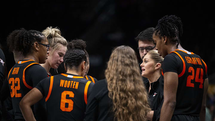 Mar 8, 2025; Kansas City, MO, USA; Oklahoma State Cowgirls head coach Jacie Hoyt talks to players during a timeout in overtime against the Baylor Lady Bears at T-Mobile Center. Mandatory Credit: Amy Kontras-Imagn Images Mar 8, 2025; Kansas City, MO, USA; Oklahoma State Cowgirls head coach Jacie Hoyt talks to players during a timeout in overtime against the Baylor Lady Bears at T-Mobile Center. Mandatory Credit: Amy Kontras-Imagn Images