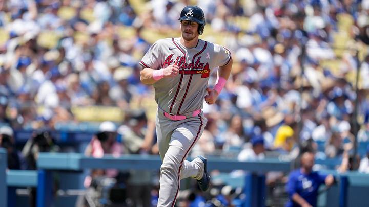 May 10, 2026; Los Angeles, California, USA; Atlanta Braves catcher Sean Murphy (12) scores against the Los Angeles Dodgers during the second inning at Dodger Stadium. Mandatory Credit: Kirby Lee-Imagn Images