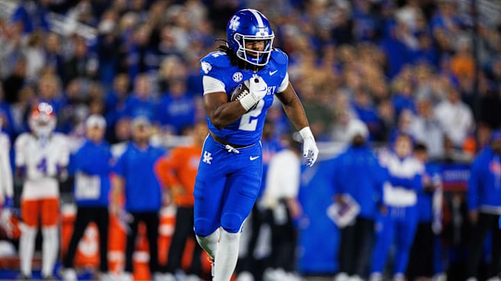 Nov 8, 2025; Lexington, Kentucky, USA; Kentucky Wildcats running back Dante Dowdell (2) runs the ball during the third quarter against the Florida Gators at Kroger Field. Mandatory Credit: Jordan Prather-Imagn Images Nov 8, 2025; Lexington, Kentucky, USA; Kentucky Wildcats running back Dante Dowdell (2) runs the ball during the third quarter against the Florida Gators at Kroger Field. Mandatory Credit: Jordan Prather-Imagn Images