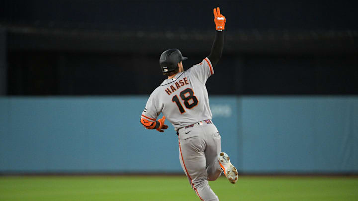 May 12, 2026; Los Angeles, California, USA; San Francisco Giants catcher Eric Haase (18) acknowledges the Giants bullpen and runs the bases after hitting a one run home run against Los Angeles Dodgers starting pitcher Yoshinobu Yamamoto (not pictured) during the third inning at Dodger Stadium. Mandatory Credit: Jayne Kamin-Oncea-Imagn Images May 12, 2026; Los Angeles, California, USA; San Francisco Giants catcher Eric Haase (18) acknowledges the Giants bullpen and runs the bases after hitting a one run home run against Los Angeles Dodgers starting pitcher Yoshinobu Yamamoto (not pictured) during the third inning at Dodger Stadium. Mandatory Credit: Jayne Kamin-Oncea-Imagn Images