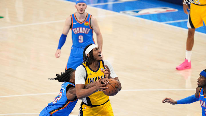 Jun 22, 2025; Oklahoma City, Oklahoma, USA; Indiana Pacers center Myles Turner (33) looks to shoot while Oklahoma City Thunder guard Cason Wallace (22) defends during the first half of game seven of the 2025 NBA Finals at Paycom Center. Mandatory Credit: Kyle Terada-Imagn Images Jun 22, 2025; Oklahoma City, Oklahoma, USA; Indiana Pacers center Myles Turner (33) looks to shoot while Oklahoma City Thunder guard Cason Wallace (22) defends during the first half of game seven of the 2025 NBA Finals at Paycom Center. Mandatory Credit: Kyle Terada-Imagn Images