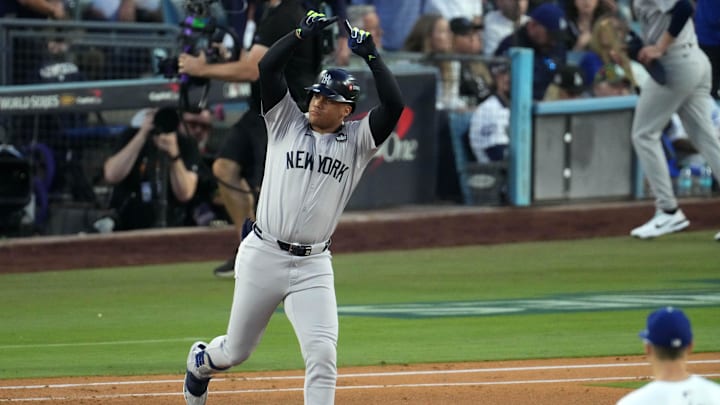 Oct 26, 2024; Los Angeles, California, USA; New York Yankees outfielder Juan Soto (22) reacts after hitting a home run against the Los Angeles Dodgers in the third inning for game two of the 2024 MLB World Series at Dodger Stadium. Mandatory Credit: Kirby Lee-Imagn Images