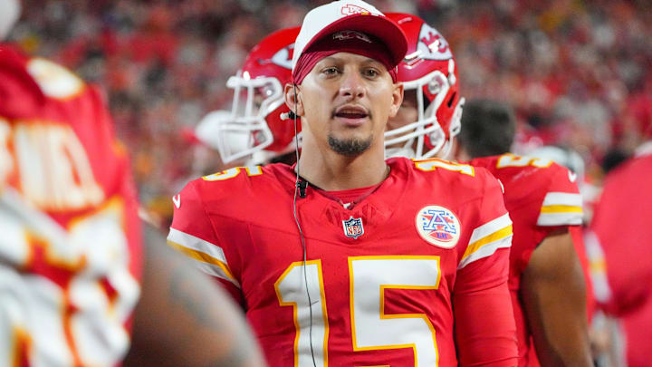 Aug 22, 2025; Kansas City, Missouri, USA; Kansas City Chiefs quarterback Patrick Mahomes (15) on the sidelines against the Chicago Bears during the first half of the game at GEHA Field at Arrowhead Stadium. Mandatory Credit: Denny Medley-Imagn Images