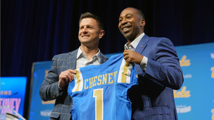 Dec 9, 2025; Los Angeles, CA, USA; UCLA Bruins football coach Bob Chesney (left) poses with athletic director Martin Jarmond at intoductory press conference at Renee Luskin Conference Center Centennial Ballroom. Mandatory Credit: Kirby Lee-Imagn Images Dec 9, 2025; Los Angeles, CA, USA; UCLA Bruins football coach Bob Chesney (left) poses with athletic director Martin Jarmond at intoductory press conference at Renee Luskin Conference Center Centennial Ballroom. Mandatory Credit: Kirby Lee-Imagn Images