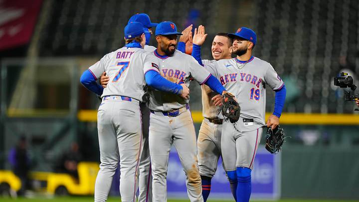 May 6, 2026; Denver, Colorado, USA;  Members of the New York Mets celebrate defeating the Colorado Rockies at Coors Field. Mandatory Credit: Ron Chenoy-Imagn Images