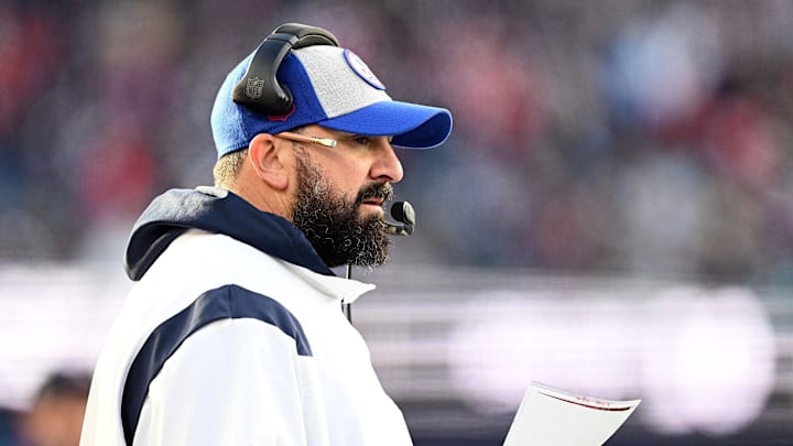 Jan 1, 2023; Foxborough, Massachusetts, USA; New England Patriots senior football advisor Matt Patricia watches a play against the Miami Dolphins during the second half at Gillette Stadium. Mandatory Credit: Brian Fluharty-Imagn Images