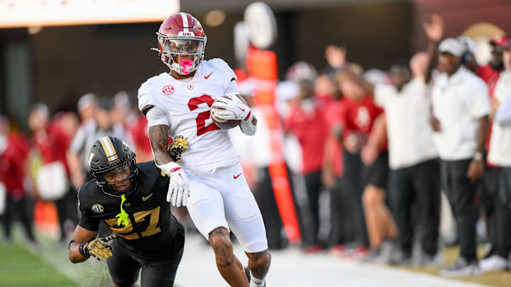 Oct 5, 2024; Nashville, Tennessee, USA;  Alabama Crimson Tide wide receiver Ryan Williams (2) makes a catch over Vanderbilt Commodores cornerback Jaylin Lackey (27) during the second half at FirstBank Stadium. Mandatory Credit: Steve Roberts-Imagn Images