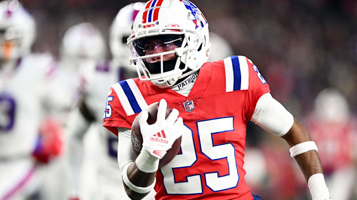 New England Patriots cornerback Marcus Jones (25) runs for a touchdown.