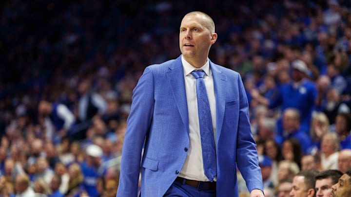 Dec 14, 2024; Lexington, Kentucky, USA; Kentucky Wildcats head coach Mark Pope watches the action during the second half against the Louisville Cardinals at Rupp Arena at Central Bank Center. Mandatory Credit: Jordan Prather-Imagn Images