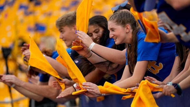 The Pittsburgh Panthers student section cheers in the first quarter of the NCAA football game between the Pittsburgh Panthers and the Cincinnati Bearcats at Acrisure Stadium in Pittsburgh on Saturday, Sept. 9, 2023. The Bearcats led 20-7 at halftime.