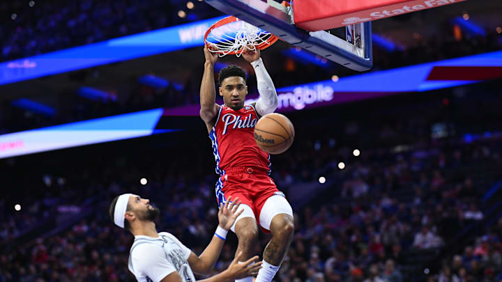 Dec 6, 2024; Philadelphia, Pennsylvania, USA; Philadelphia 76ers forward KJ Martin (1) dunks against Orlando Magic guard Jalen Suggs (4) in the fourth quarter at Wells Fargo Center. Mandatory Credit: Kyle Ross-Imagn Images