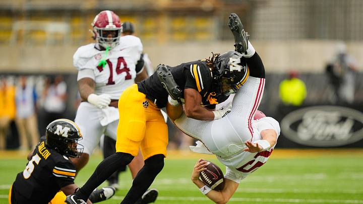 Oct 11, 2025; Columbia, Missouri, USA; Missouri Tigers safety Santana Banner (15) hits Alabama Crimson Tide quarterback Ty Simpson (15) during the first half of the game at Faurot Field at Memorial Stadium. Mandatory Credit: Jay Biggerstaff-Imagn Images Oct 11, 2025; Columbia, Missouri, USA; Missouri Tigers safety Santana Banner (15) hits Alabama Crimson Tide quarterback Ty Simpson (15) during the first half of the game at Faurot Field at Memorial Stadium. Mandatory Credit: Jay Biggerstaff-Imagn Images
