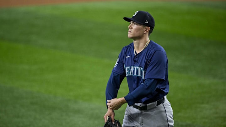 Seattle Mariners starting pitcher Bryan Woo (22) walks off the field after he pitches against the Texas Rangers during the second inning at Globe Life Field on Sept 22.