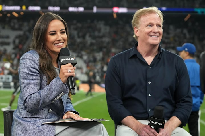 Sideline reporter Kaylee Hartung interviews NFL commissioner Roger Goodell during the 2024 NFL Sao Paolo Game