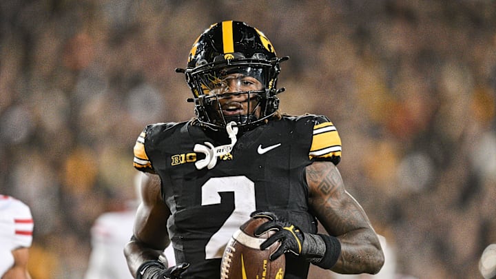 Nov 2, 2024; Iowa City, Iowa, USA;  Iowa Hawkeyes running back Kaleb Johnson (2) runs for a 16 yard touchdown against the Wisconsin Badgers during the second quarter at Kinnick Stadium. Mandatory Credit: Jeffrey Becker-Imagn Images