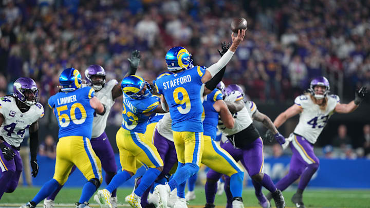 Jan 13, 2025; Glendale, AZ, USA; Los Angeles Rams quarterback Matthew Stafford (9) drops back to pass against the Minnesota Vikings during the second half in an NFC wild card game at State Farm Stadium. Mandatory Credit: Joe Camporeale-Imagn Images Jan 13, 2025; Glendale, AZ, USA; Los Angeles Rams quarterback Matthew Stafford (9) drops back to pass against the Minnesota Vikings during the second half in an NFC wild card game at State Farm Stadium. Mandatory Credit: Joe Camporeale-Imagn Images